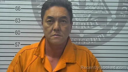 Mugshot of Tuan Minh Pham booked in Harrison County, Mississippi on October 4, 2026
