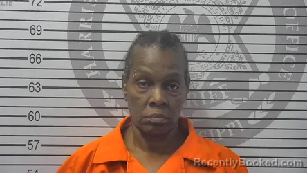Mugshot of Athalia Felice Kirsh booked in Harrison County, Mississippi on October 14, 2026