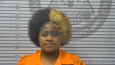 Mugshot of Maximina Danihka Taylor booked in Harrison County, Mississippi on October 17, 2026