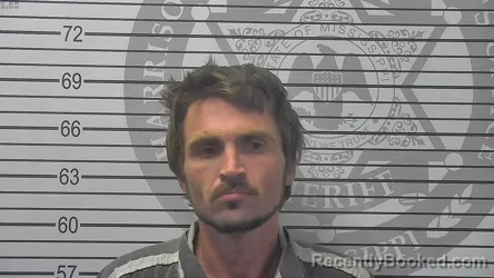 Mugshot of Charles Daniel Tucker booked in Harrison County, Mississippi on October 22, 2026