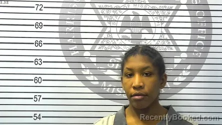 Mugshot of AKIA KAREN BENNETT booked in Harrison County, Mississippi on March 17, 2026