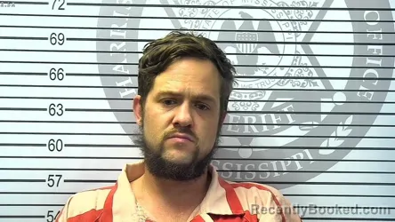 Mugshot of AUSTIN DEAN DELANO booked in Harrison County, Mississippi on April 4, 2026