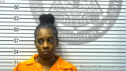 Mugshot of ALICIA NICHOLE HOLMES booked in Harrison County, Mississippi on March 11, 2026