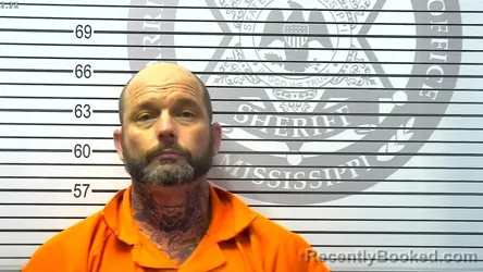 Mugshot of ANDREW LEWIS HOLLAND booked in Harrison County, Mississippi on March 17, 2026