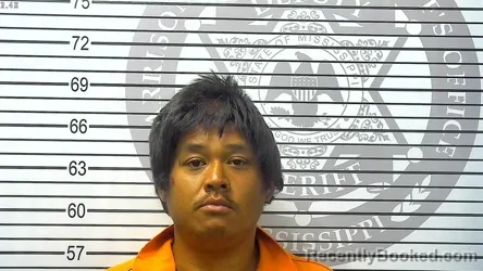 Mugshot of ANDREW HOA NGUYEN booked in Harrison County, Mississippi on March 26, 2026