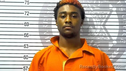 Mugshot of CHRISTOPHER MICHAEL THOMAS booked in Harrison County, Mississippi on March 12, 2026