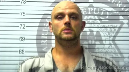 Mugshot of CHRISTOPHER RYAN WELLMAN booked in Harrison County, Mississippi on March 19, 2026