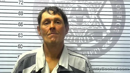 Mugshot of DANIEL DEMOUEY