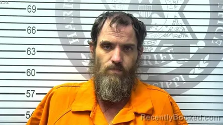 Mugshot of DANIEL CHRISTOPHER HOLLAND booked in Harrison County, Mississippi on March 20, 2026