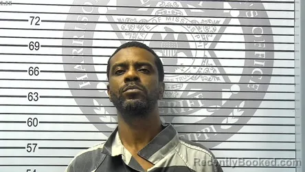 Mugshot of DACRON ANDREE MAGEE booked in Harrison County, Mississippi on March 24, 2026