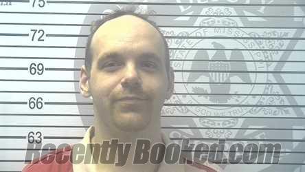 Booking photo from Harrison County, Mississippi