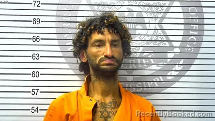 Mugshot of JONATHAN EARL BUSH booked in Harrison County, Mississippi on March 22, 2026