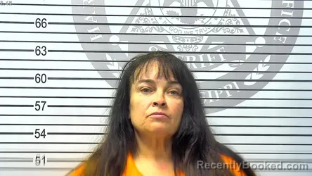 Mugshot of JENNIFER ANN BROWN booked in Harrison County, Mississippi on March 12, 2026