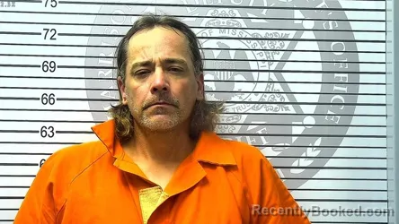 Mugshot of JOHNATHAN MICHAEL CRUSE booked in Harrison County, Mississippi on March 24, 2026