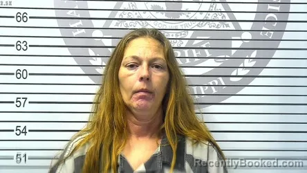 Mugshot of JEANNIE MARIE CLARK booked in Harrison County, Mississippi on March 13, 2026