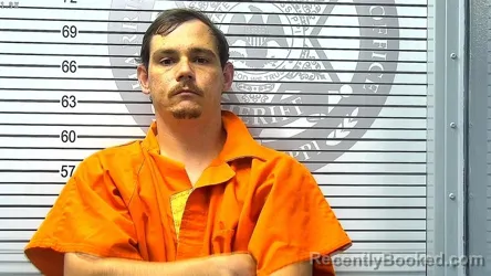 Mugshot of JACOB ROSS DAVIGNON booked in Harrison County, Mississippi on March 26, 2026