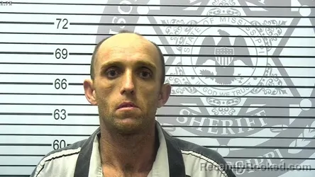 Booking photo from Harrison County, Mississippi