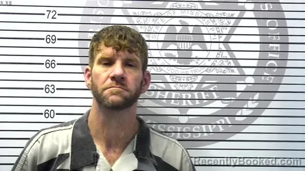 Mugshot of JUSTIN ALEXANDER PERRYMAN booked in Harrison County, Mississippi on March 23, 2026