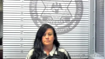 Mugshot of JENNIFER MICHELLE PARFAIT booked in Harrison County, Mississippi on March 4, 2026