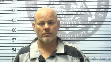 Booking photo from Harrison County, Mississippi