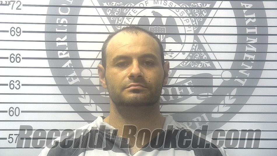 Booking photo from Harrison County, Mississippi