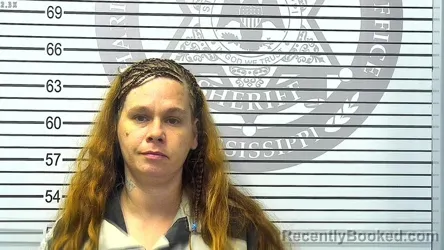 Mugshot of KAREN MARIE COOPER booked in Harrison County, Mississippi on March 24, 2026