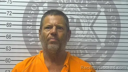 Booking photo from Harrison County, Mississippi