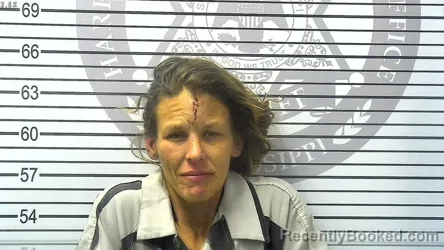 Booking photo from Harrison County, Mississippi