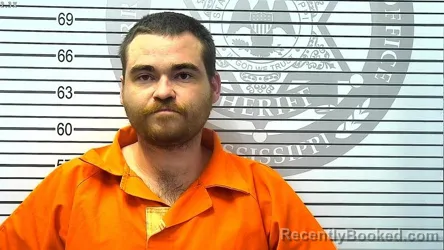 Mugshot of MASON DIXON MOORE booked in Harrison County, Mississippi on March 13, 2026