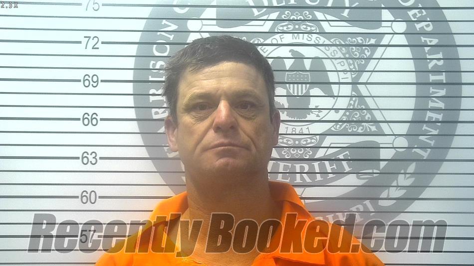 Booking photo from Harrison County, Mississippi