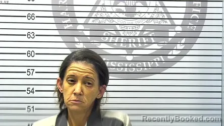 Mugshot of MELANIE PAGE TOMASICH booked in Harrison County, Mississippi on March 7, 2026
