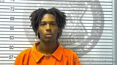 Mugshot of NE'SEAN MAURICE THOMAS booked in Harrison County, Mississippi on March 24, 2026