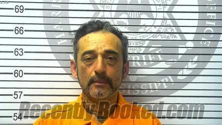 Booking photo from Harrison County, Mississippi