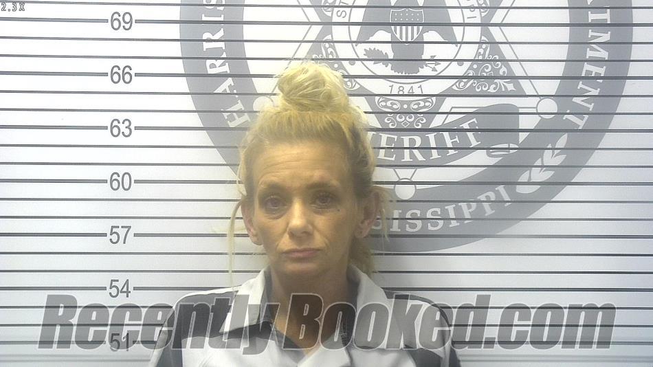 Booking photo from Harrison County, Mississippi