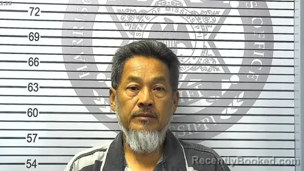 Mugshot of SUTHEP . SANGPRAWEJ booked in Harrison County, Mississippi on March 25, 2026