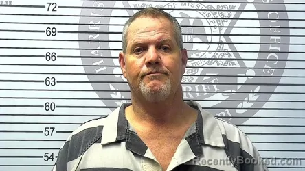 Mugshot of TRAVIS NATHANIEL MURRAY booked in Harrison County, Mississippi on March 23, 2026