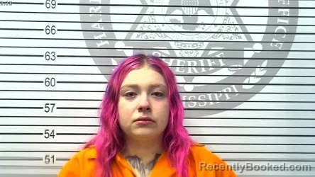 Mugshot of YASENIA JOELENA ACUNA booked in Harrison County, Mississippi on March 4, 2026