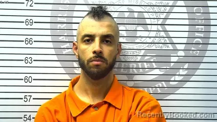 Mugshot of YOUNES MAAROUFI booked in Harrison County, Mississippi on March 12, 2026