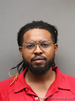 Mugshot of JSON SAMPLE booked in Hinds County, Mississippi on March 12, 2026