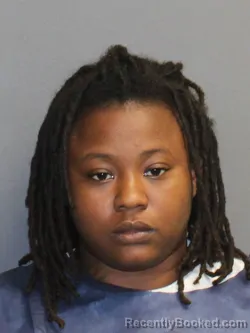 Mugshot of Alasia Brown Harris booked in Hinds County, Mississippi on August 30, 2026