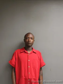 Mugshot of GODWIN CHIKE MOORE booked in Hinds County, Mississippi on May 22, 2026
