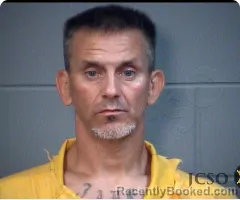 Mugshot of JUSTIN R MACDONALD booked in Jackson County, Mississippi on April 1, 2026