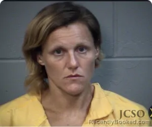 Mugshot of April T Carter booked in Jackson County, Mississippi on August 18, 2026
