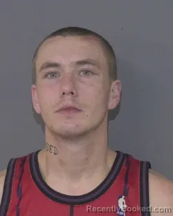 Mugshot of JUSTIN WAYNE SIMPSON