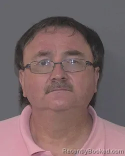 Mugshot of RUSSELL EDDIE ADCOCK booked in Union County, North Carolina on August 5, 2026