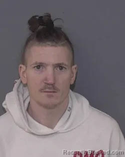 Mugshot of JUSTIN KYLE THOMAS