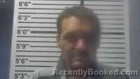Mugshot of Aaron May booked in Jones County, Mississippi on August 22, 2026