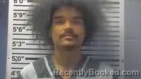 Mugshot of Malik Moore booked in Jones County, Mississippi on August 29, 2026