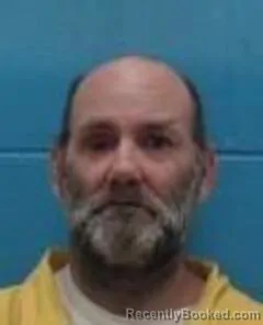 Mugshot of SHANNON M DOINE