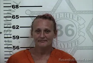 Mugshot of CHARLOTTE DELLINE MOORE-ROBINSON booked in Lafayette County, Mississippi on July 14, 2026